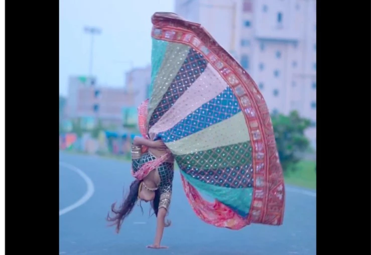 Lehenga-clad woman effortlessly does a somersault