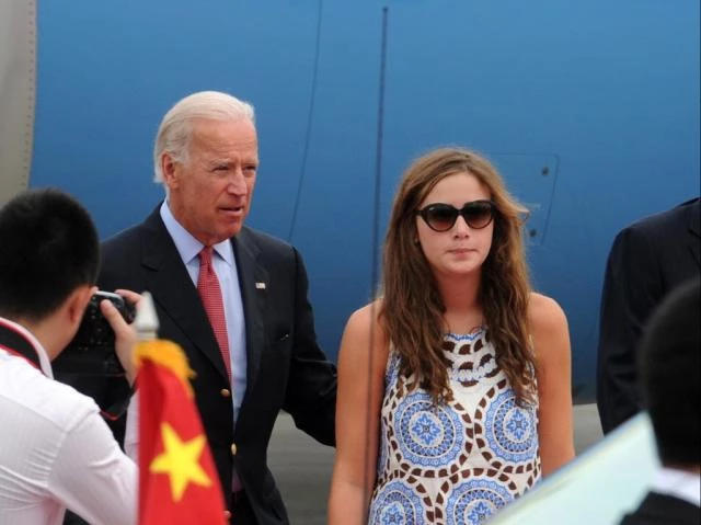 Biden granddaughter's guard opens fire during car break-in