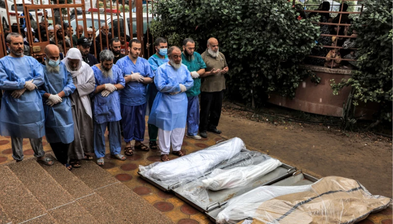 Gaza's embattled main hospital buries patients in 'mass grave'