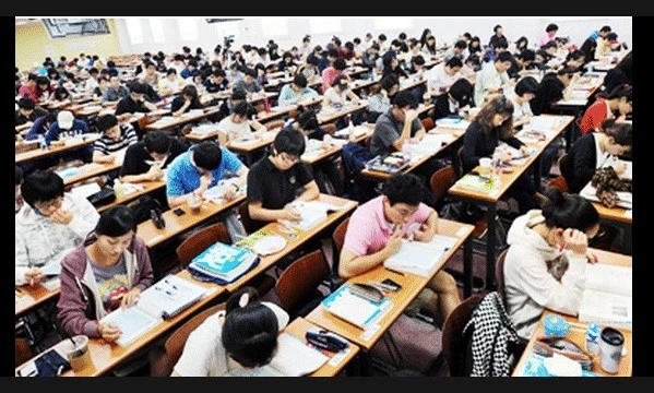 South Koreans sit key exam as flights halted to limit distraction