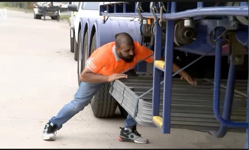 Drunk Australian hitches ride under truck