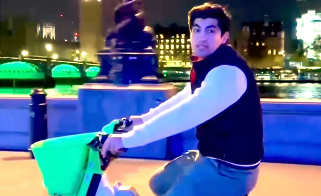 Naseem Shah riding two-wheeler on London street