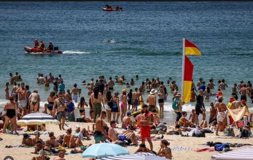 Sydney bakes in hottest day in three years