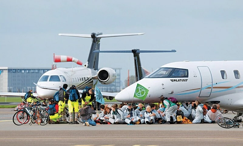 Climate protesters block Belgian Alibaba hub, private jets