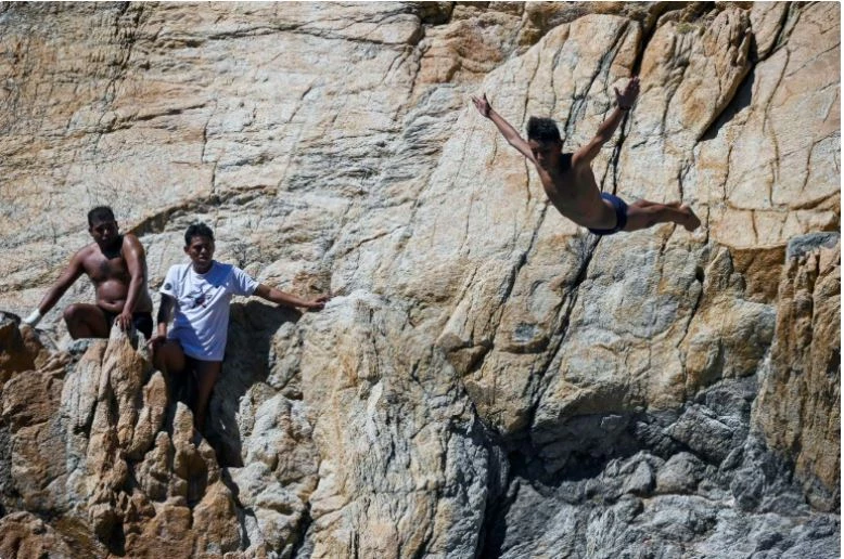 Acapulco's cliff divers are back after deadly hurricane