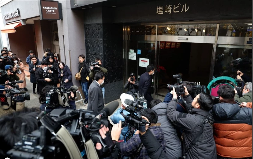 Japan prosecutors raid ruling party offices over kickback scandal