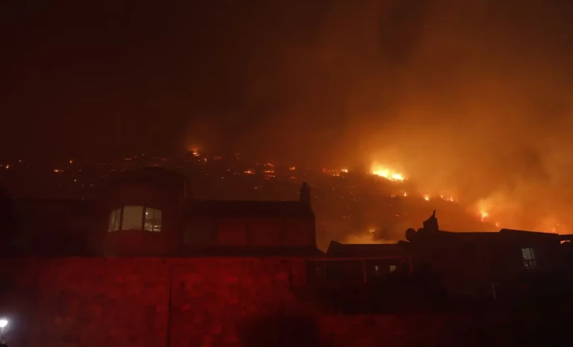 Hundreds battle wildfire threatening S. Africa naval base