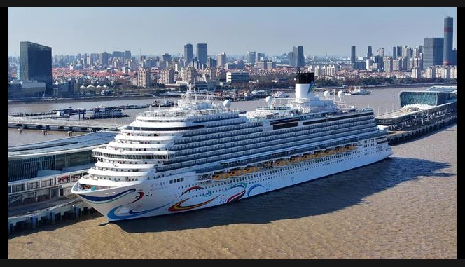 China's first domestically-built cruise ship begins maiden voyage