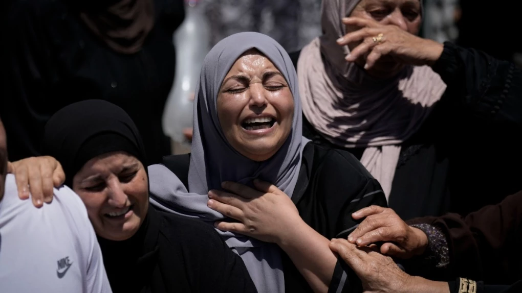 Tears, defiance in Palestinian village of slain Hamas deputy