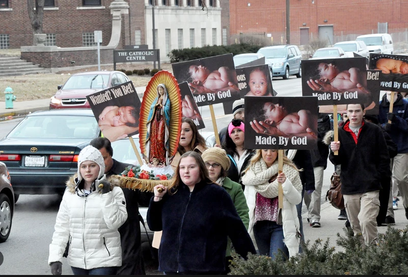 Anti-abortion activists march on snowy Washington