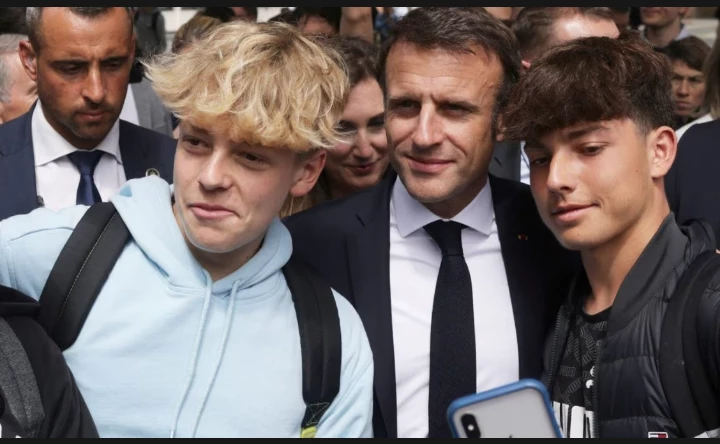 Blue pullover with grey trousers to become France's school fashion