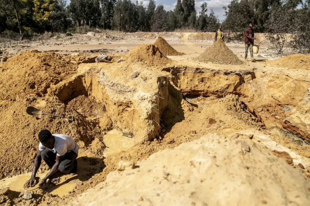 South African miners see gold in hills of waste