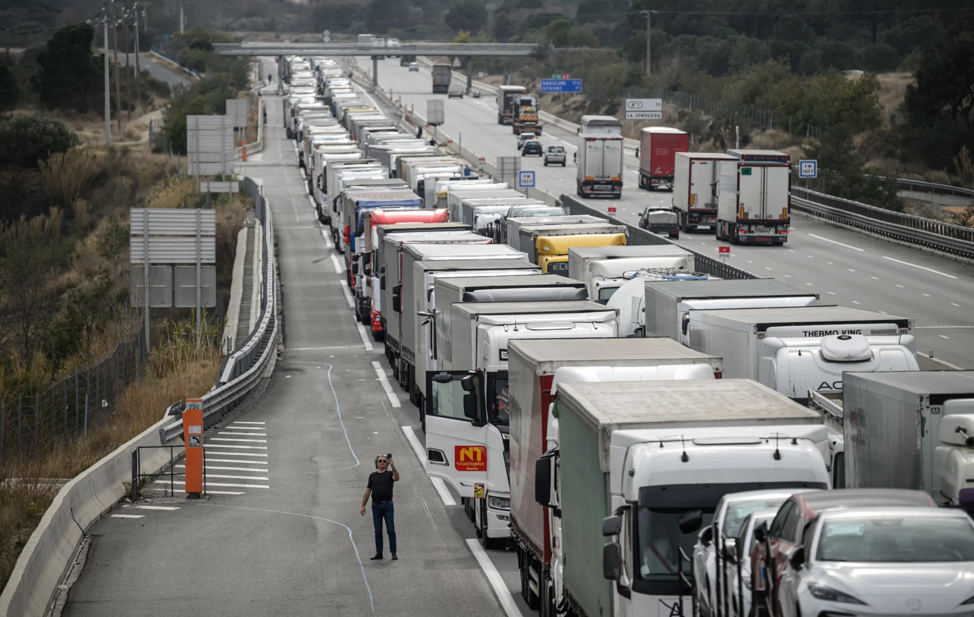 France offers cash and support to placate farmers protesting against fuel duty hike