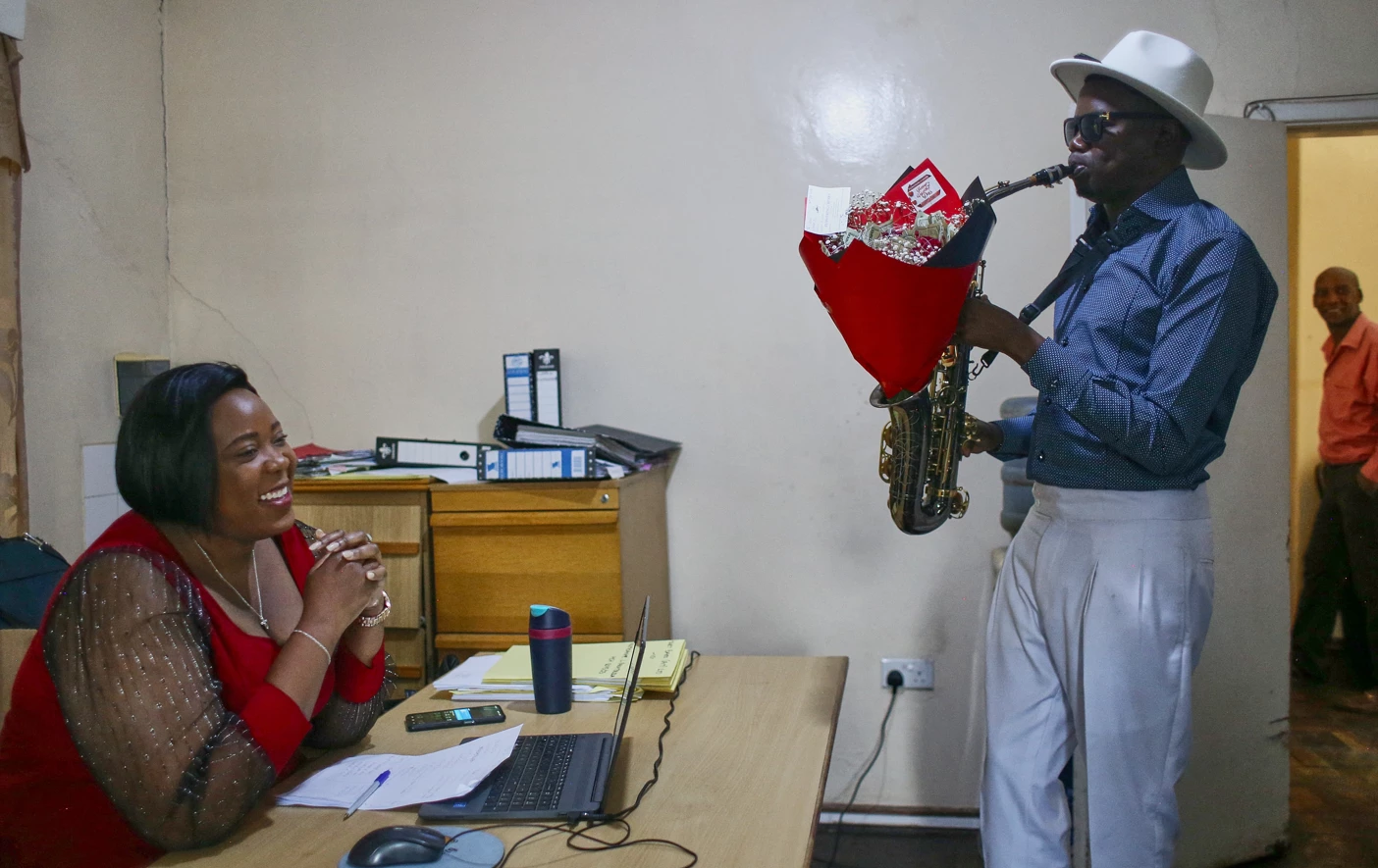 Sax appeal: Zimbabwe sweethearts send surprise serenades