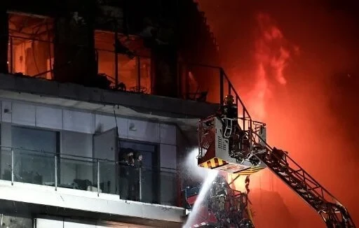 Ten dead, many missing after fire guts Spanish apartment block