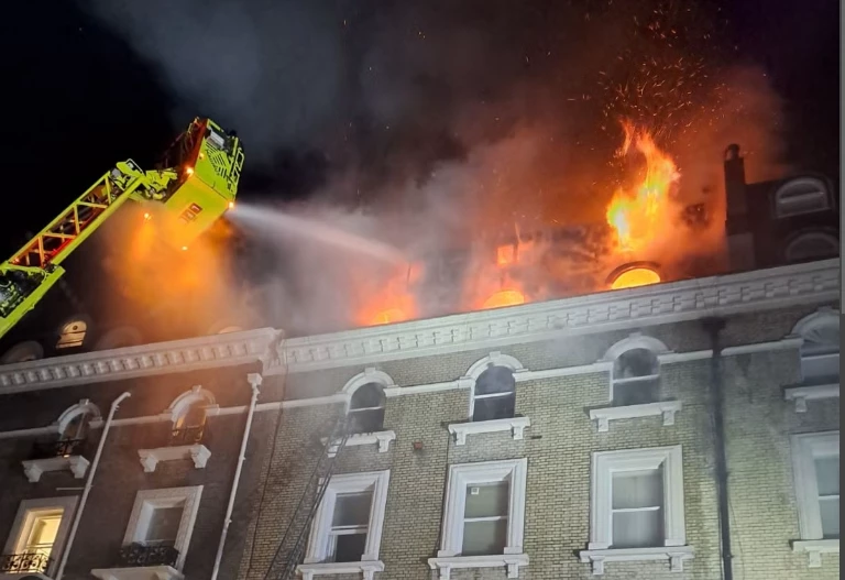 11 in hospital after huge fire rips through London apartment block