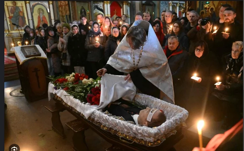 Navalny buried in Moscow amid thousands of defiant mourners