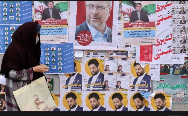 Polls open in Iran elections as conservatives expected to dominate