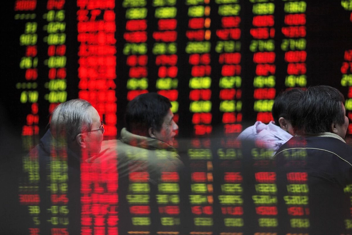 Asian markets mostly down as China sets 5 percent growth goal