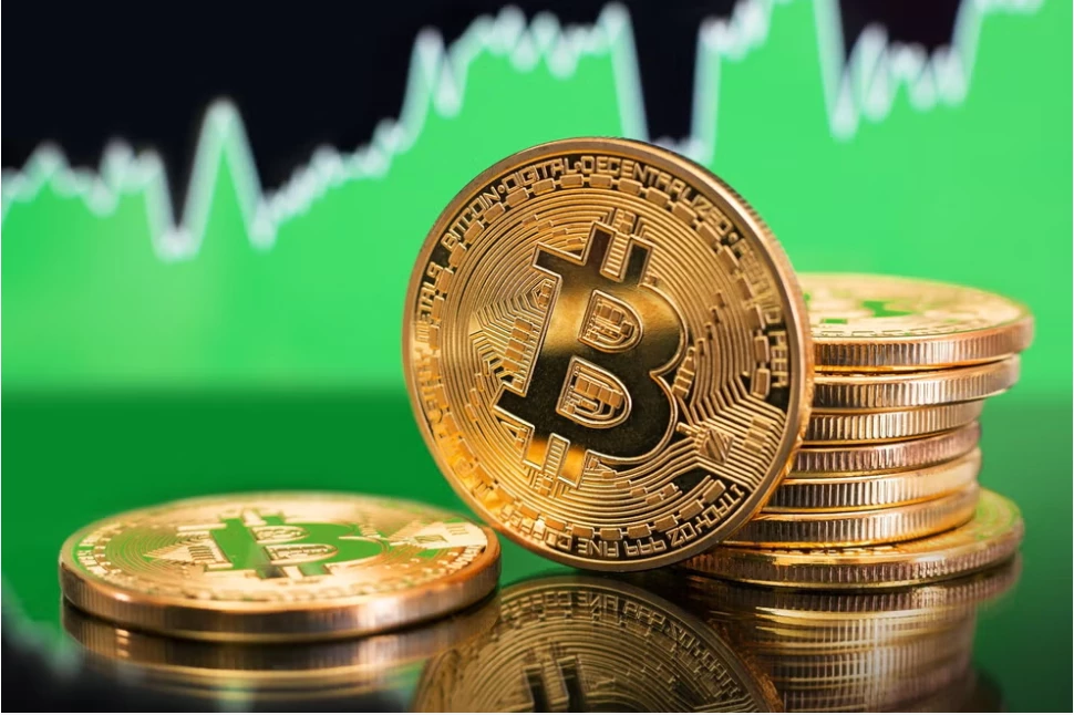 Gold, bitcoin pull back from records as US stock markets slip