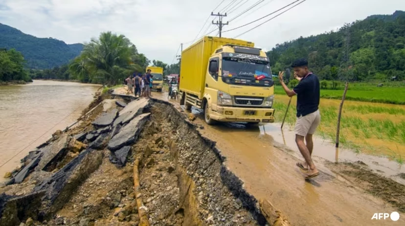 Death toll from Indonesia floods, landslides rises to 26