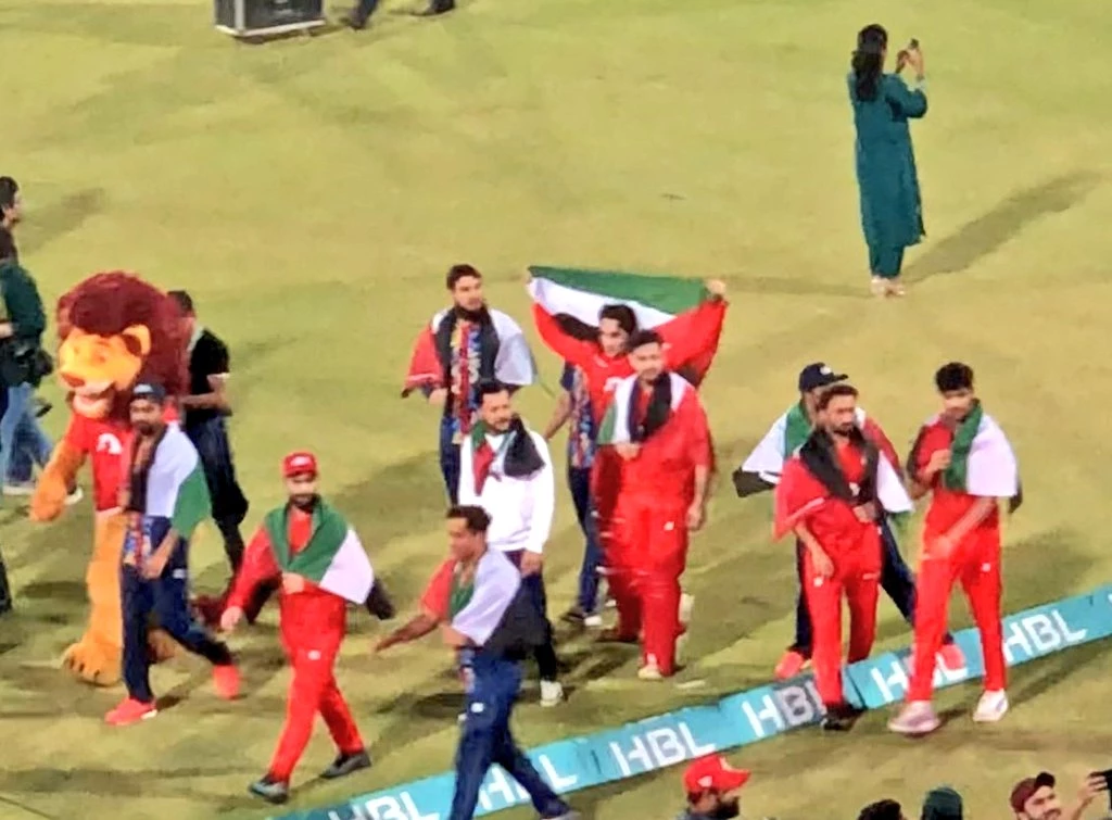 Islamabad players celebrate victory with Palestine flag