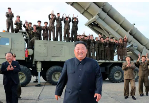 N. Korea's Kim oversees 'super-large' rocket launcher drills