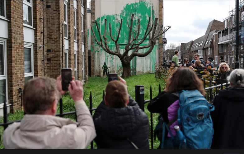 Banksy mural to be protected after London paint attack