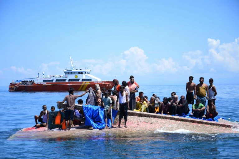 Desperate, dehydrated Rohingyas picked up in dramatic sea rescue