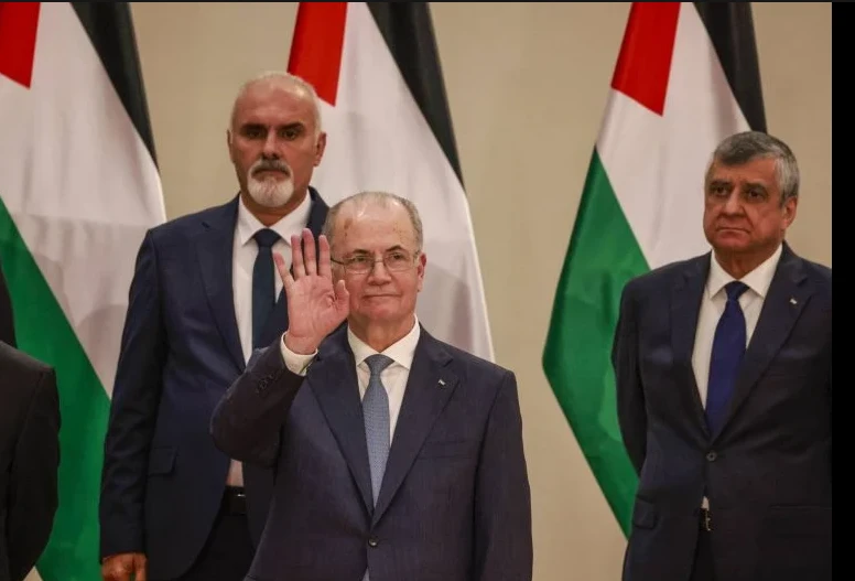 New Palestinian government gets wary greeting