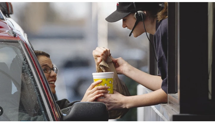 California fast food workers hail pay hike