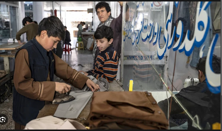 Afghan tailors outfit Eid celebrations with gleaming garb