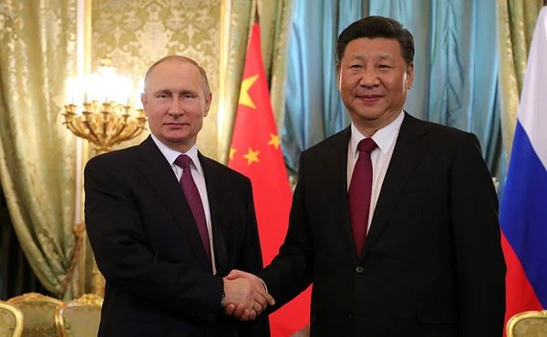 China rebuffs 'criticism or pressure' over ties with Russia