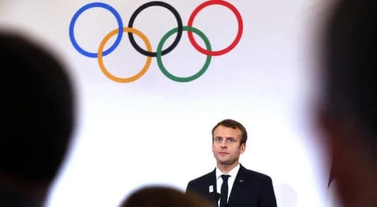 Macron says Olympic opening ceremony could move from river to stadium if security threat