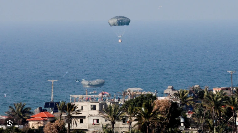 Gaza man turns aid parachute into shelter