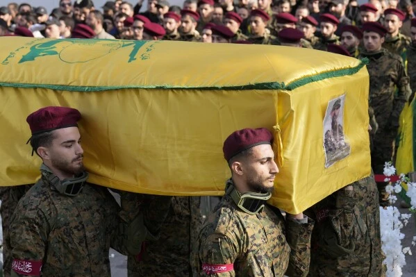 Hezbollah says launched drones at Israel bases after fighter's killing