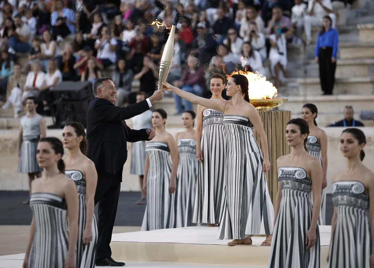 Greece hands Olympic flame to 2024 Paris Games hosts