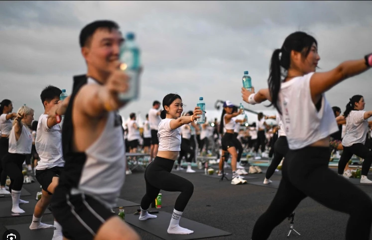 Hundreds do yoga on Thai airport runway