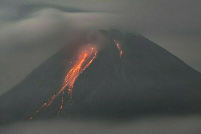 Volcano erupts in eastern Indonesia, spews miles-high ash tower