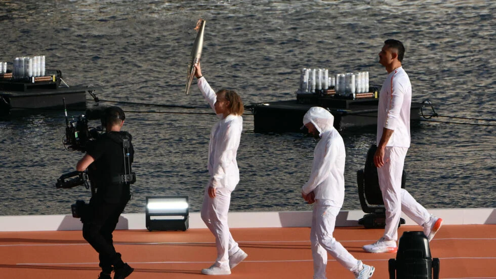 Olympic flame arrives on French soil for Paris Games