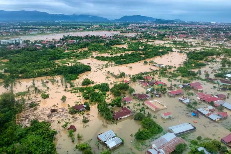 12 dead after Indonesia flash floods, cold lava flow