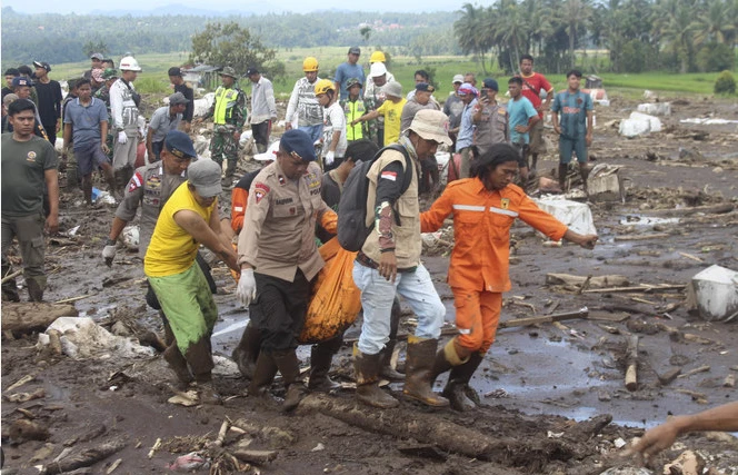 Indonesia floods kill 58 as rescuers race to find missing