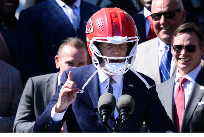 Helmet-wearing Biden aims to emulate back-to-back Super Bowl champs