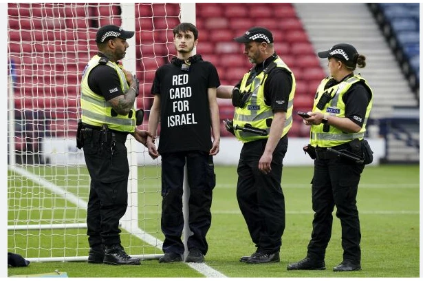 Protester chains himself to goalpost delaying Scotland-Israel women's match