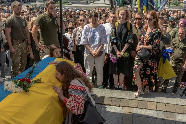 Hundreds bid farewell to Ukrainian volunteer medic killed on front lines