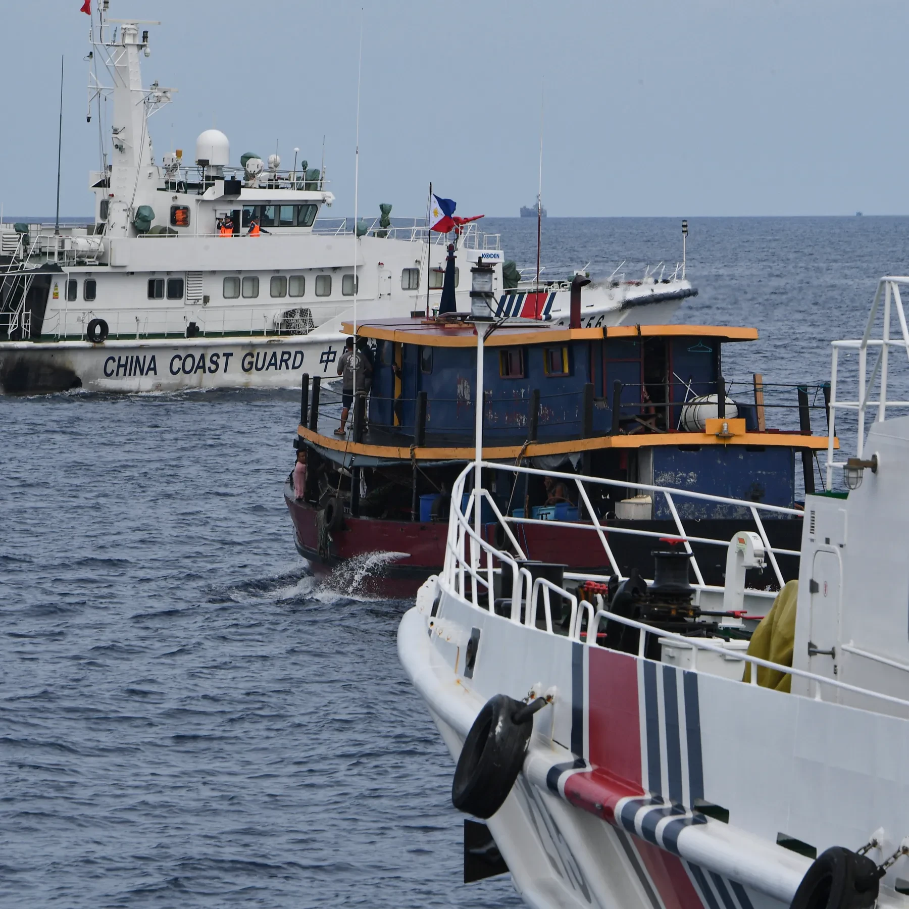 Philippines says Chinese boats seized supplies airdropped to Filipino outpost