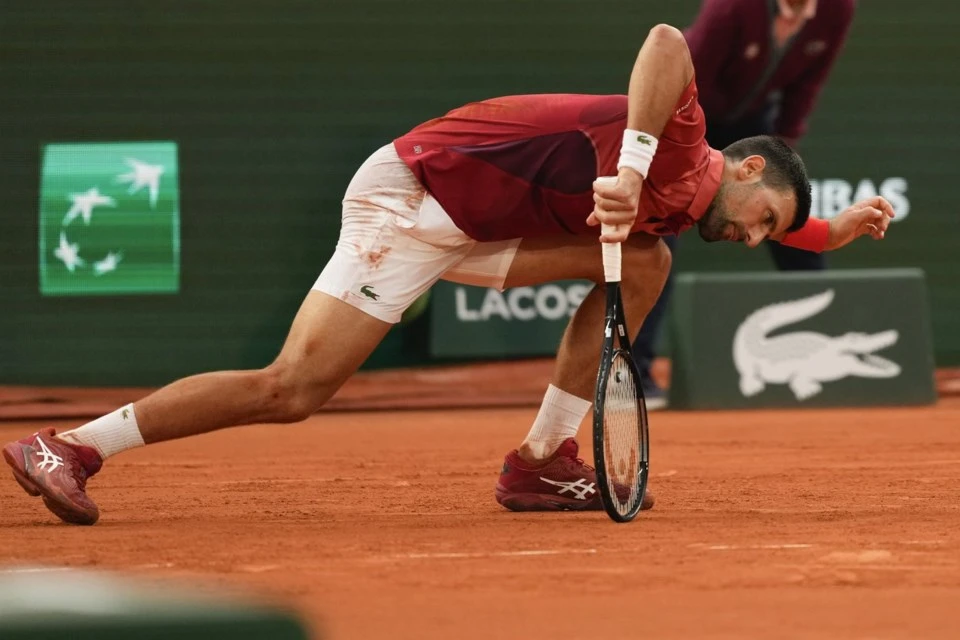 'Really sad' Djokovic out of French Open with knee injury