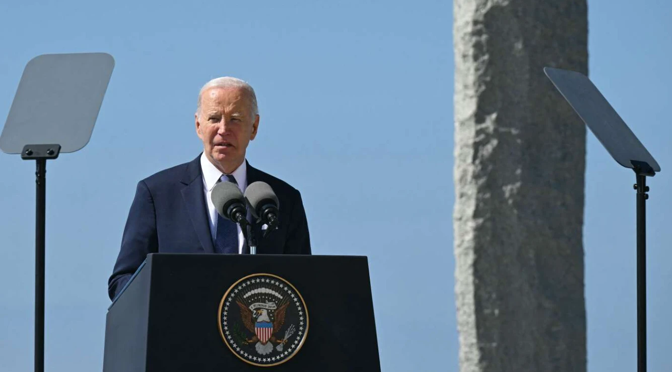 Biden urges US to protect democracy at key D-Day site