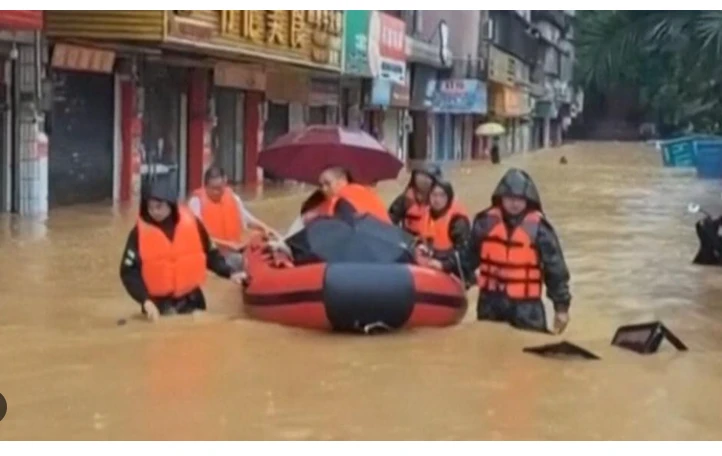 Over a dozen people missing as extreme weather hits China