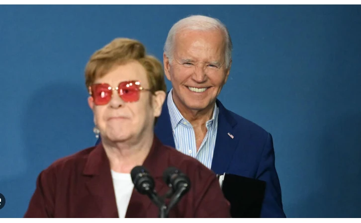 Biden takes stage with Elton John to celebrate LGBTQ milestone